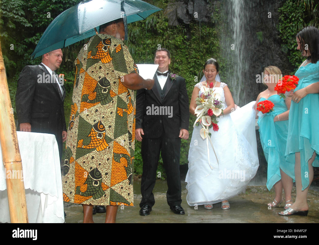 caribbean wedding ceremony in the rain in soufriere st lucia Stock Photo