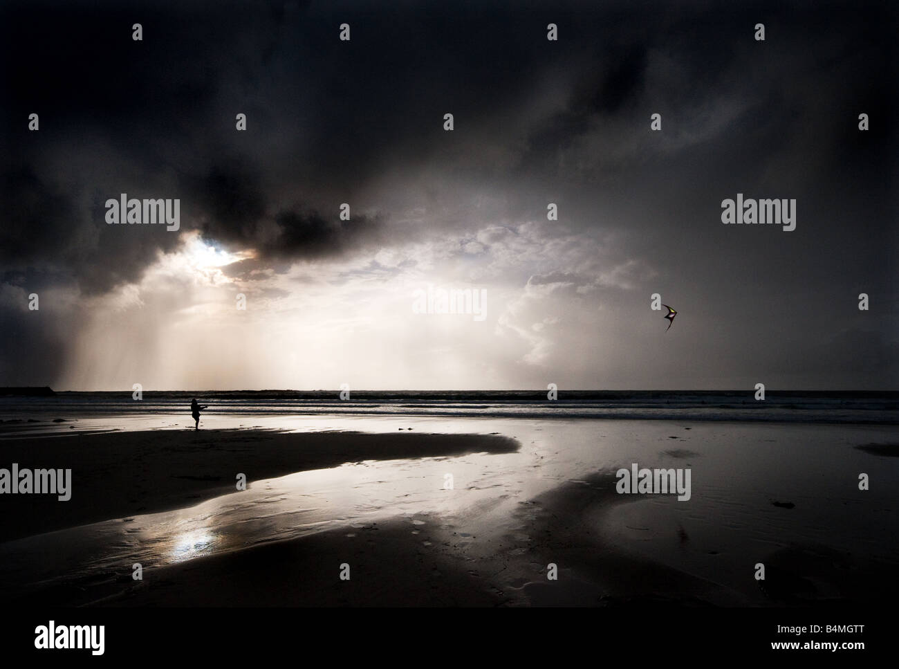 Man flying kite storm closes hires stock photography and images Alamy