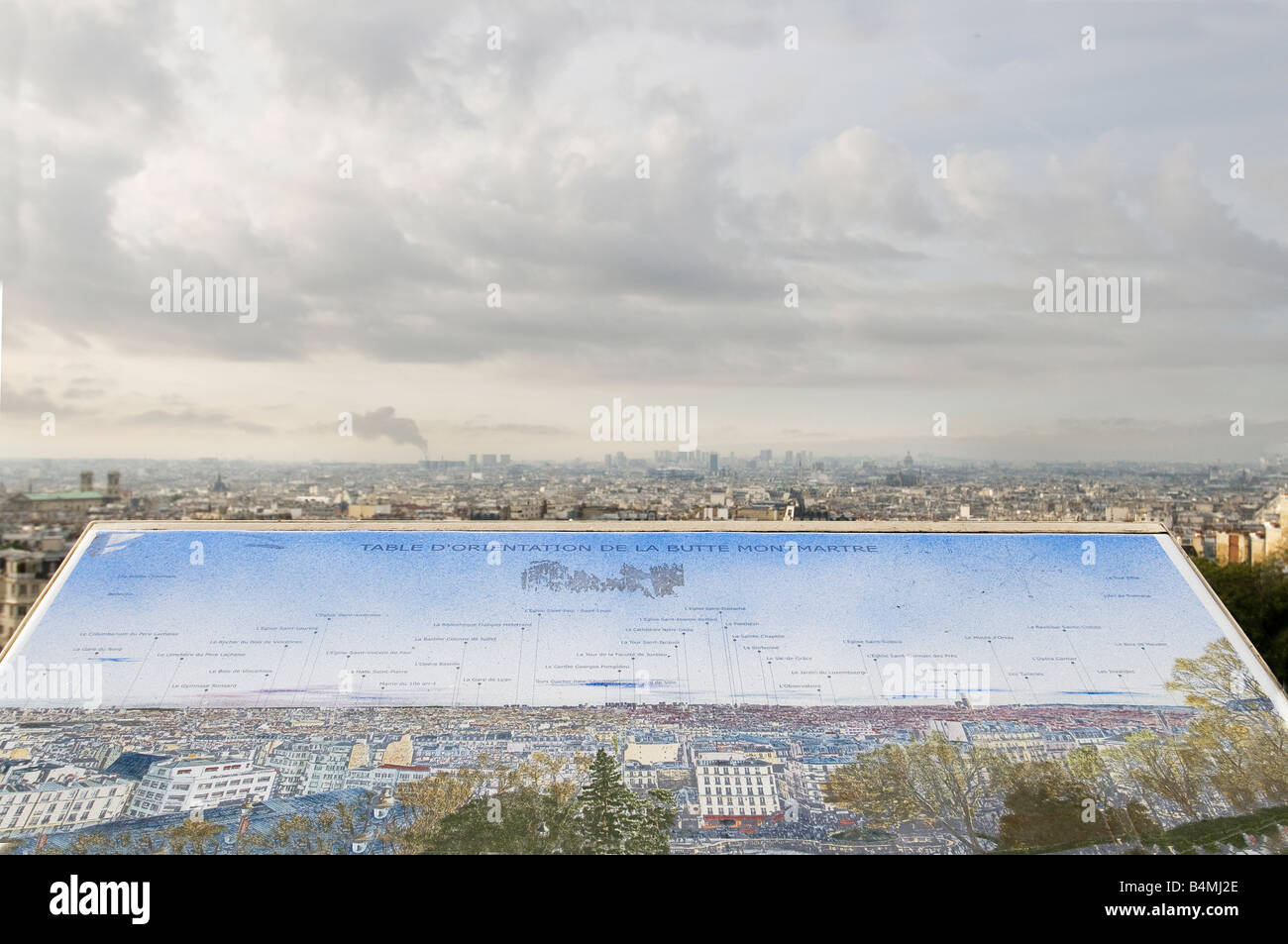 A vie of Paris from the Montmartre hill with an explicative  map of the city Stock Photo