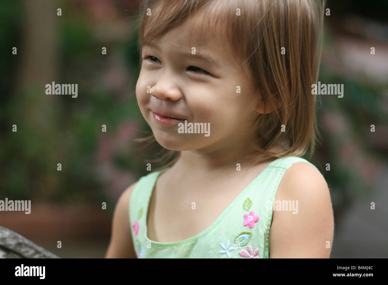A 2 year old Girl Smiles Stock Photo Alamy