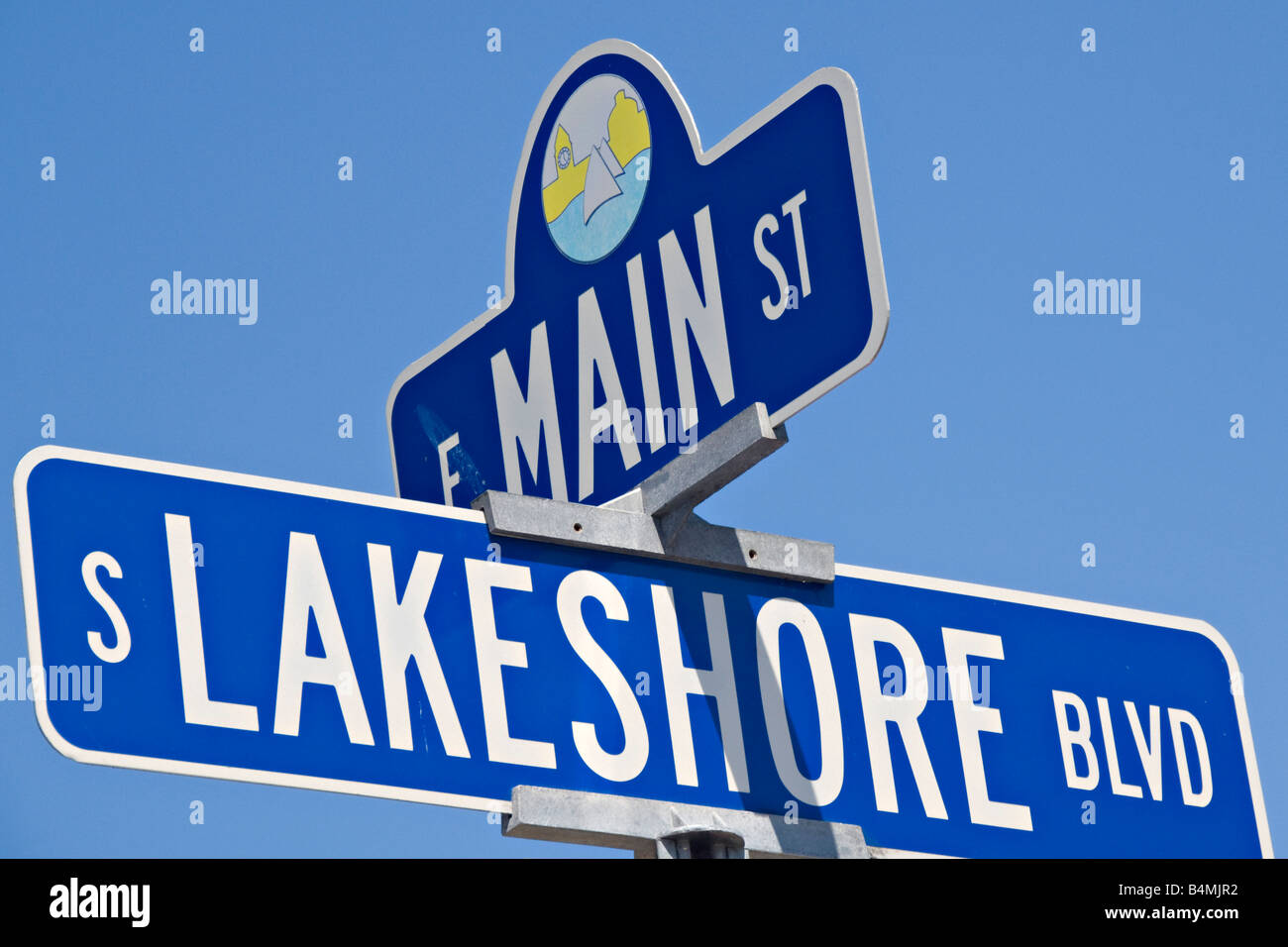 Road sign for intersection of Main Street and Lakeshore Boulevard in downtown Marquette Michigan Stock Photo