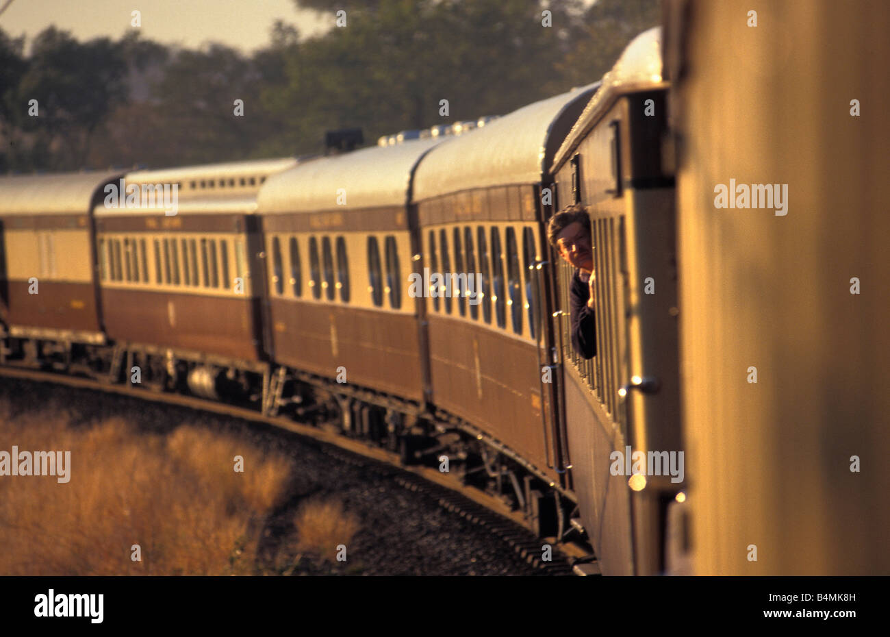 Zimbabwe. Victoria Falls. Steam train. Man looking out of window