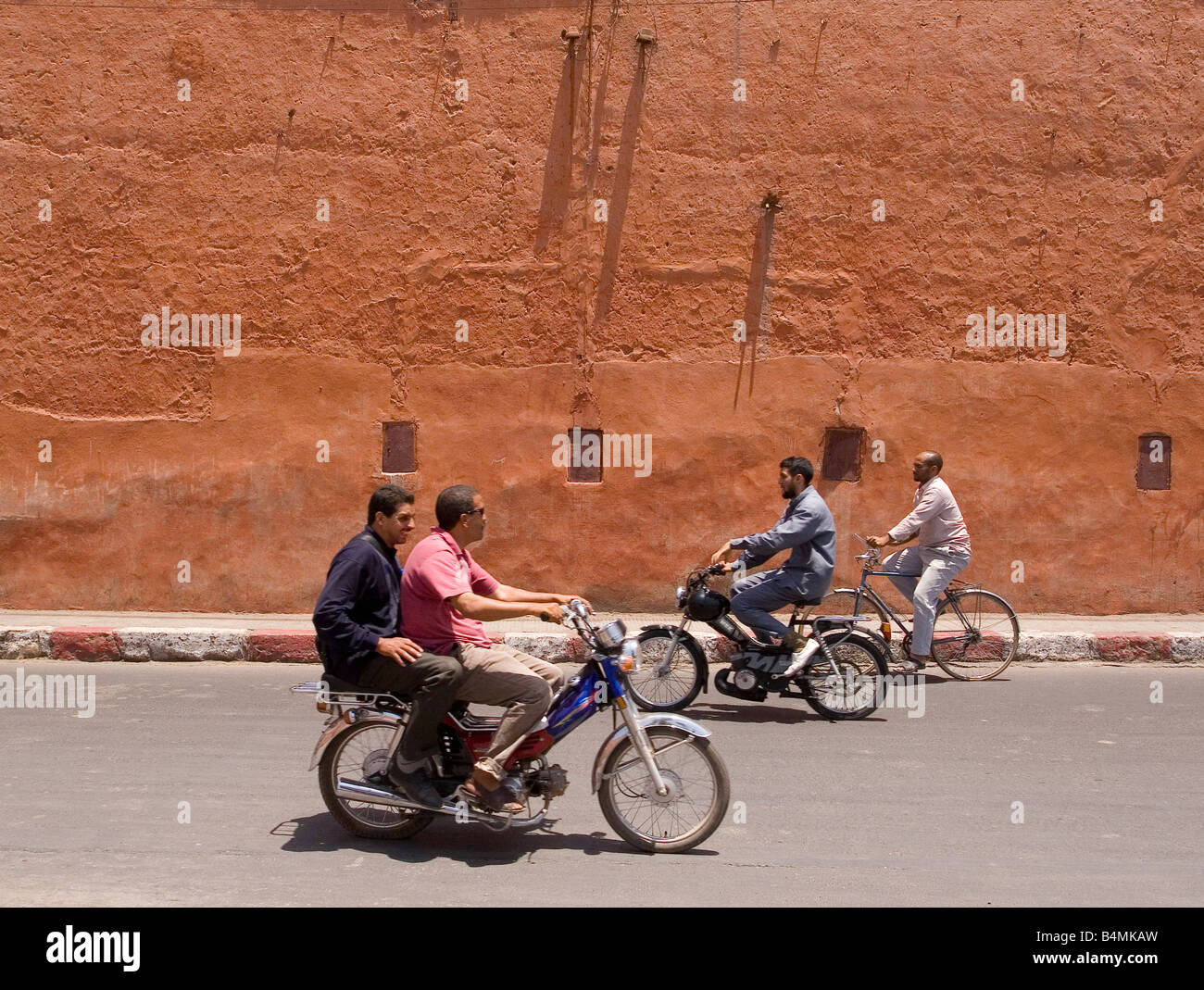 Moroccans on motorbikes in Marrakesh 2007 Stock Photo