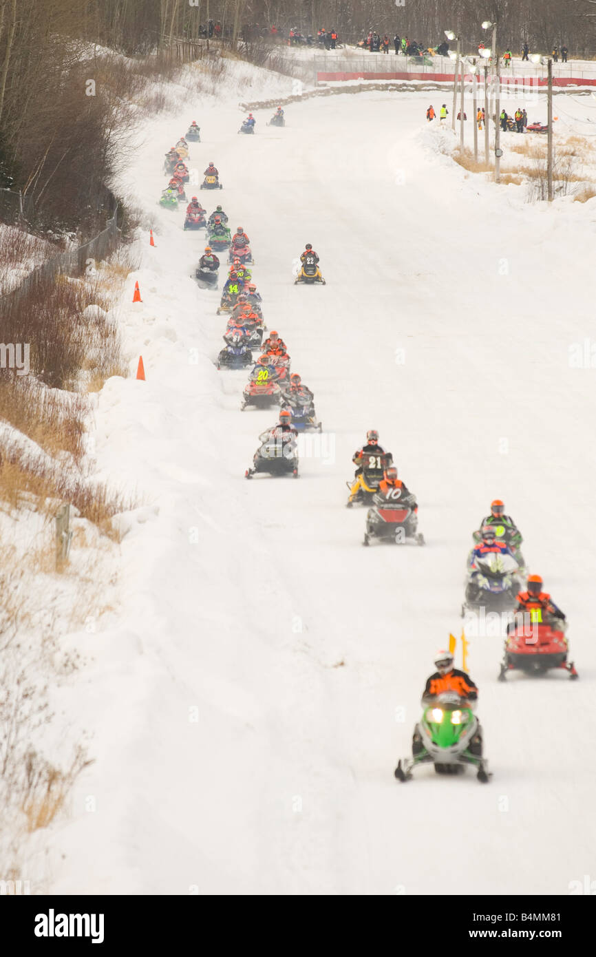 Snowmobile racing action at the I 500 Snowmobile race in Sault Ste