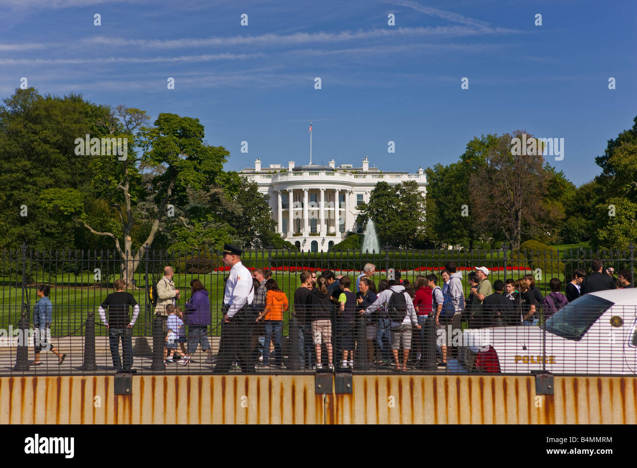 WASHINGTON DC USA - The White House, tourists at fence with police Stock Photo