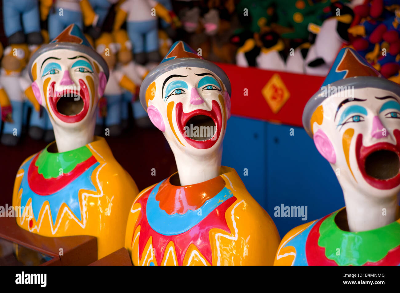 Clown game at an amusement park Stock Photo - Alamy