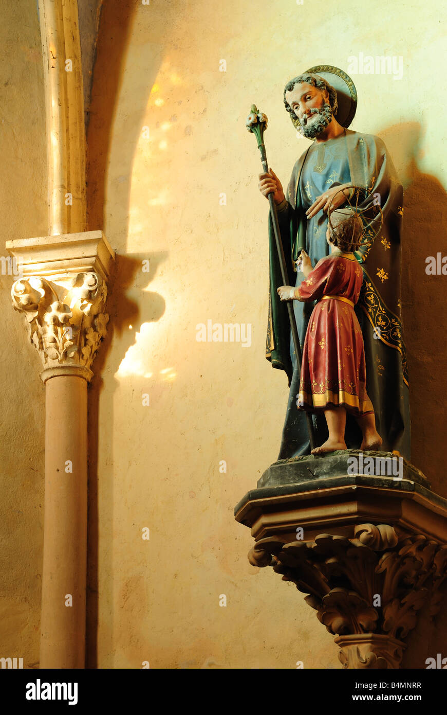 Painted statue of saint at Castelfranc Midi Pyrénées France Stock Photo