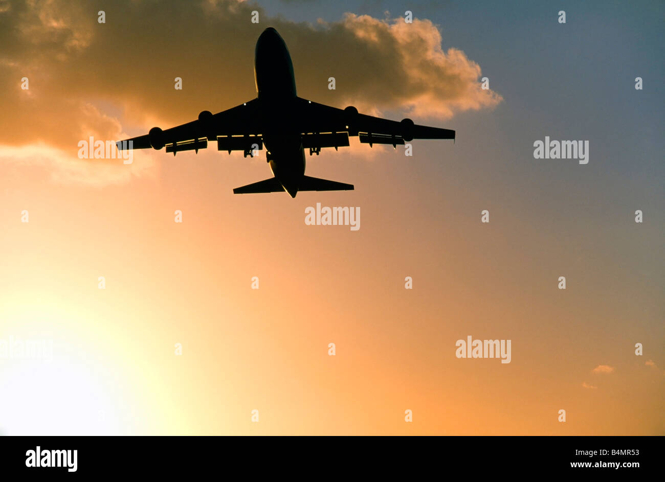 Commercial Airliner takeoff at sunset, Miami International Airport Stock Photo