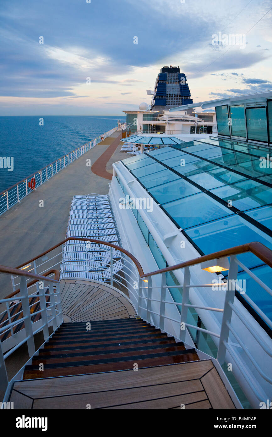 Early morning light on deserted cruise ship deck while sailing the Inside Passage from Seattle to Alaska Stock Photo