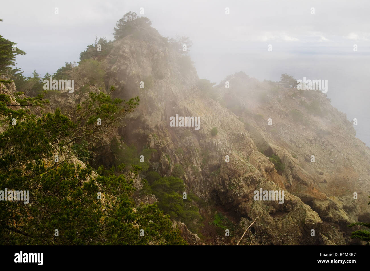 Mist and cliffs at Terra Chã on Porto Santo the neighbouring island to Madeira Stock Photo