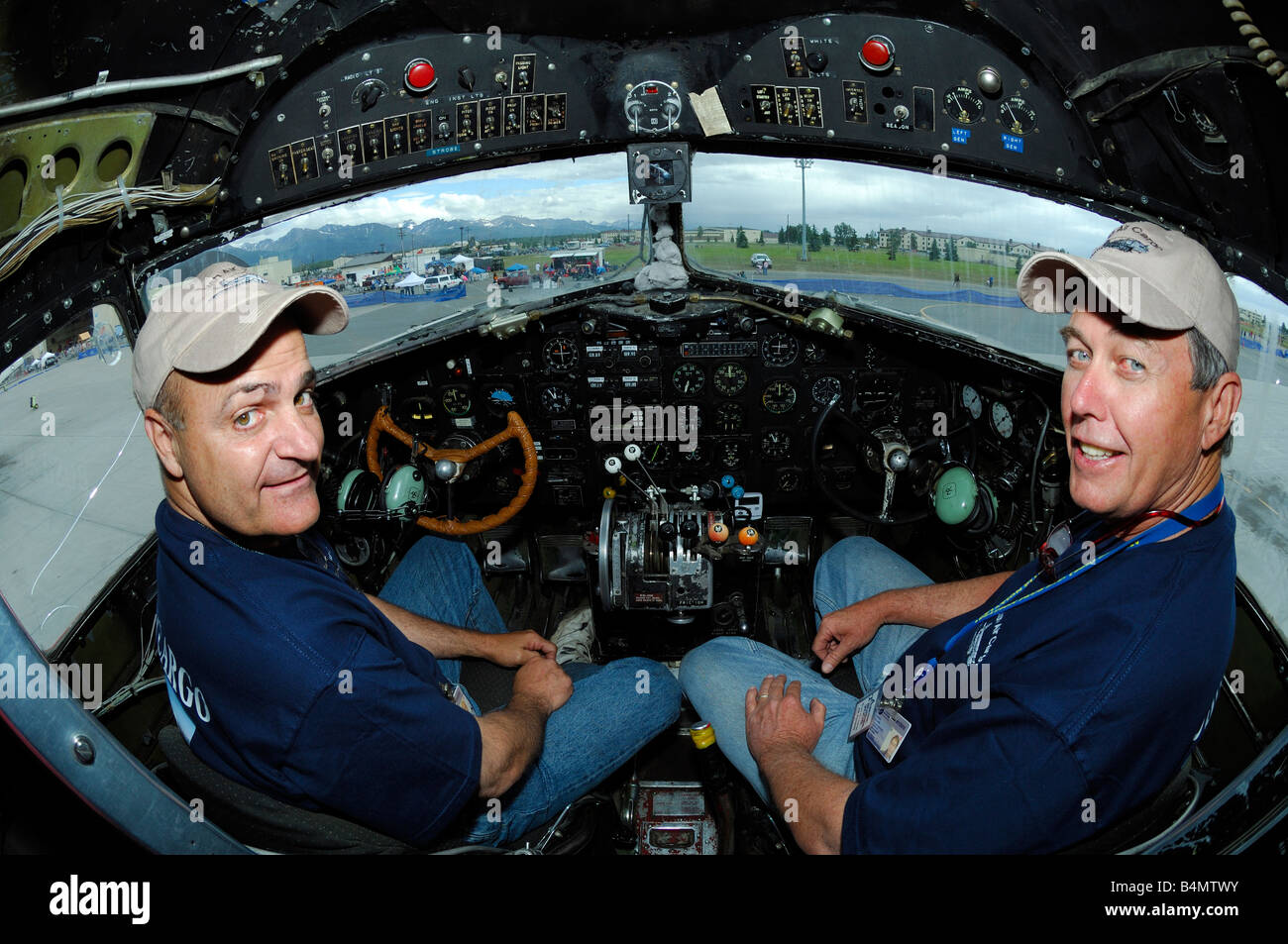 Pilots in cockpit of legendary old airliner Douglas  DC-3 Dakota,  Anchorage, Alaska, USA Stock Photo