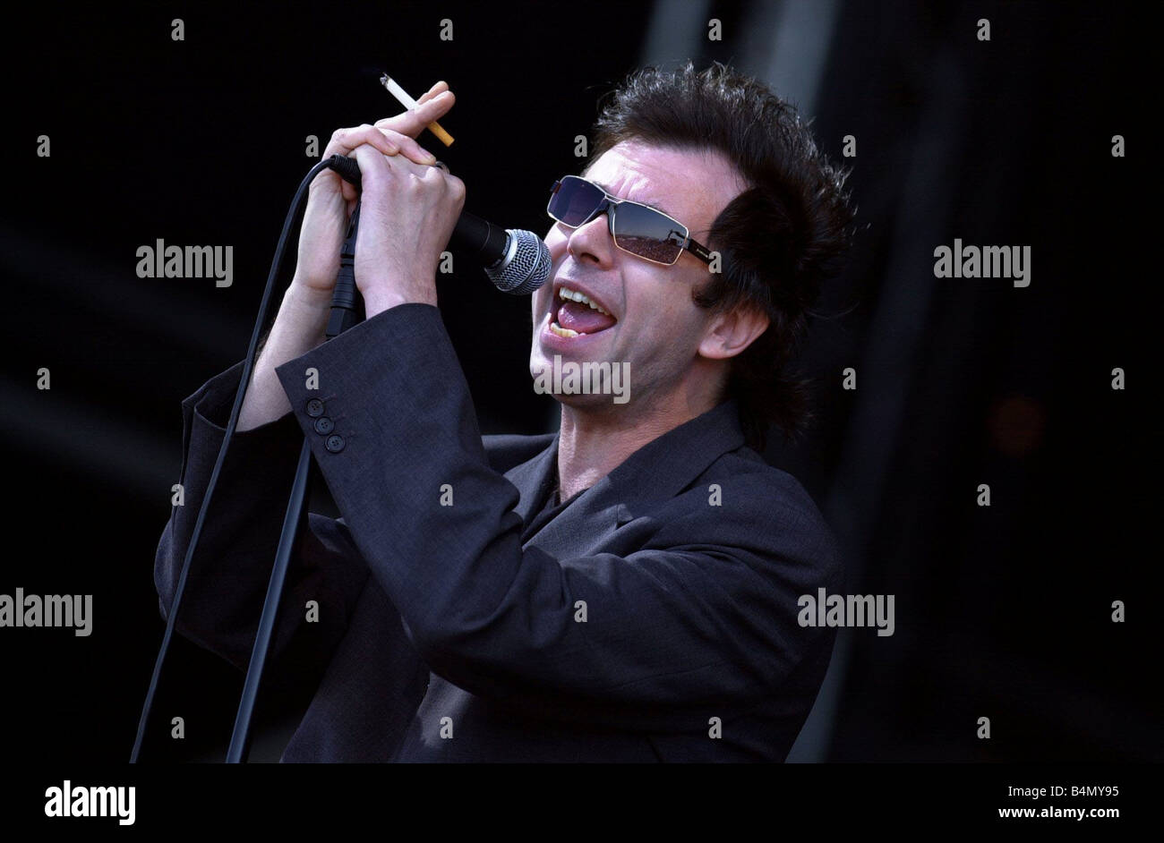 Ian McCulloch onstage at T In The Park July 2003 Echo And The Bunnymen pop singer Stock Photo
