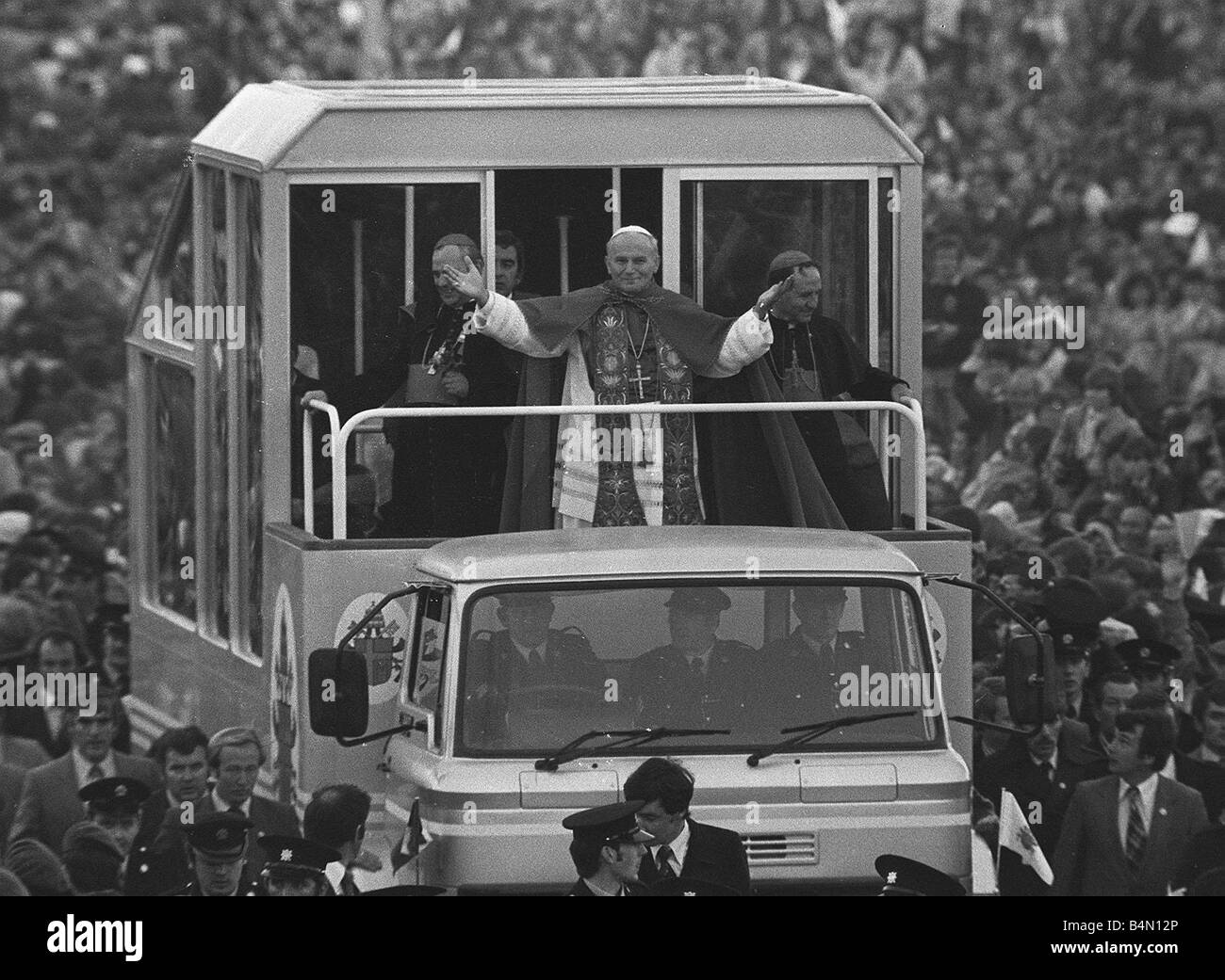 Pope John Paul II gives a blessing from his popemobile during his visit to ireland Stock Photo