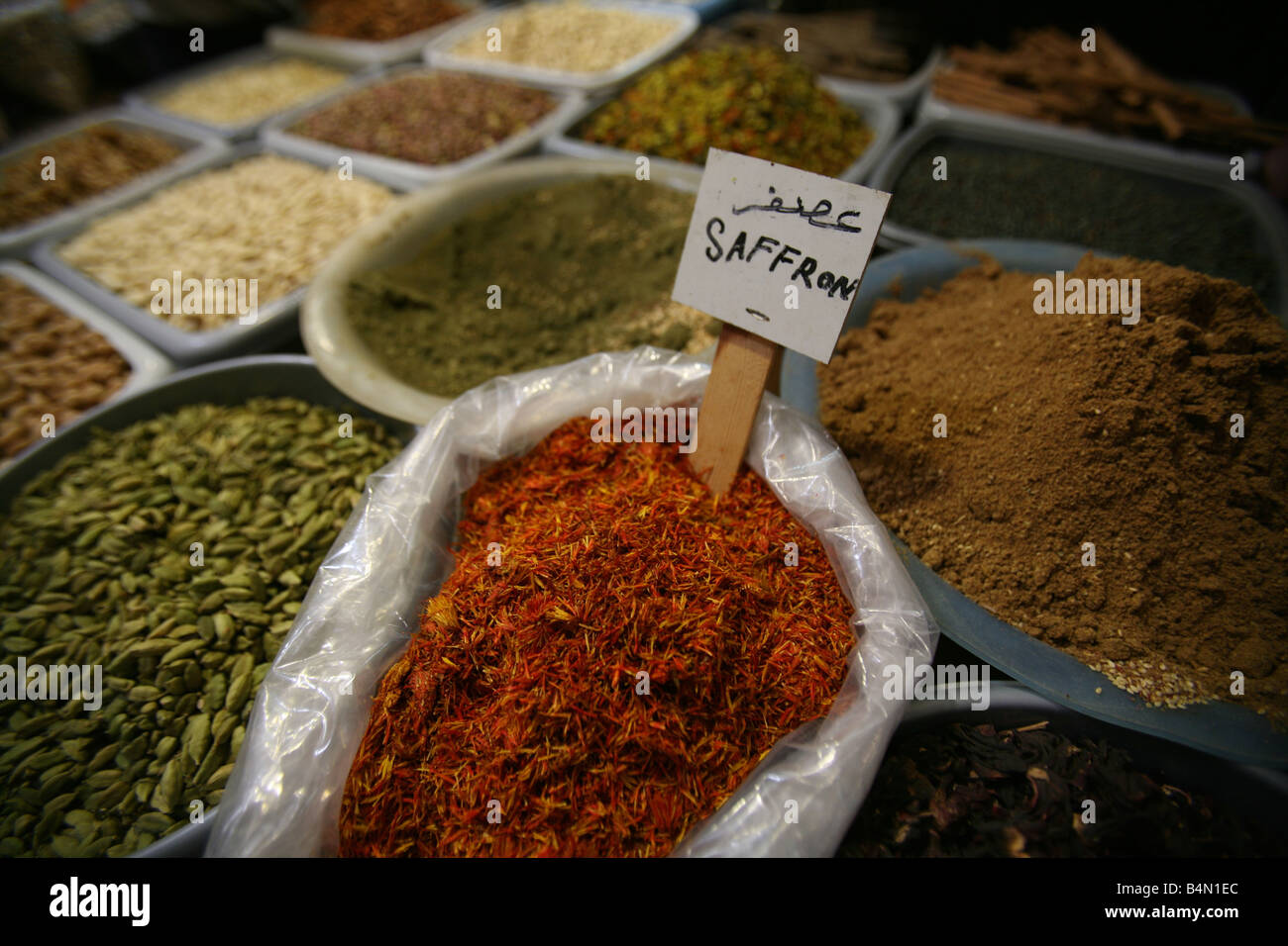 Saffron and other spices and food for sale at a market in the old city section of Jerusalem Stock Photo