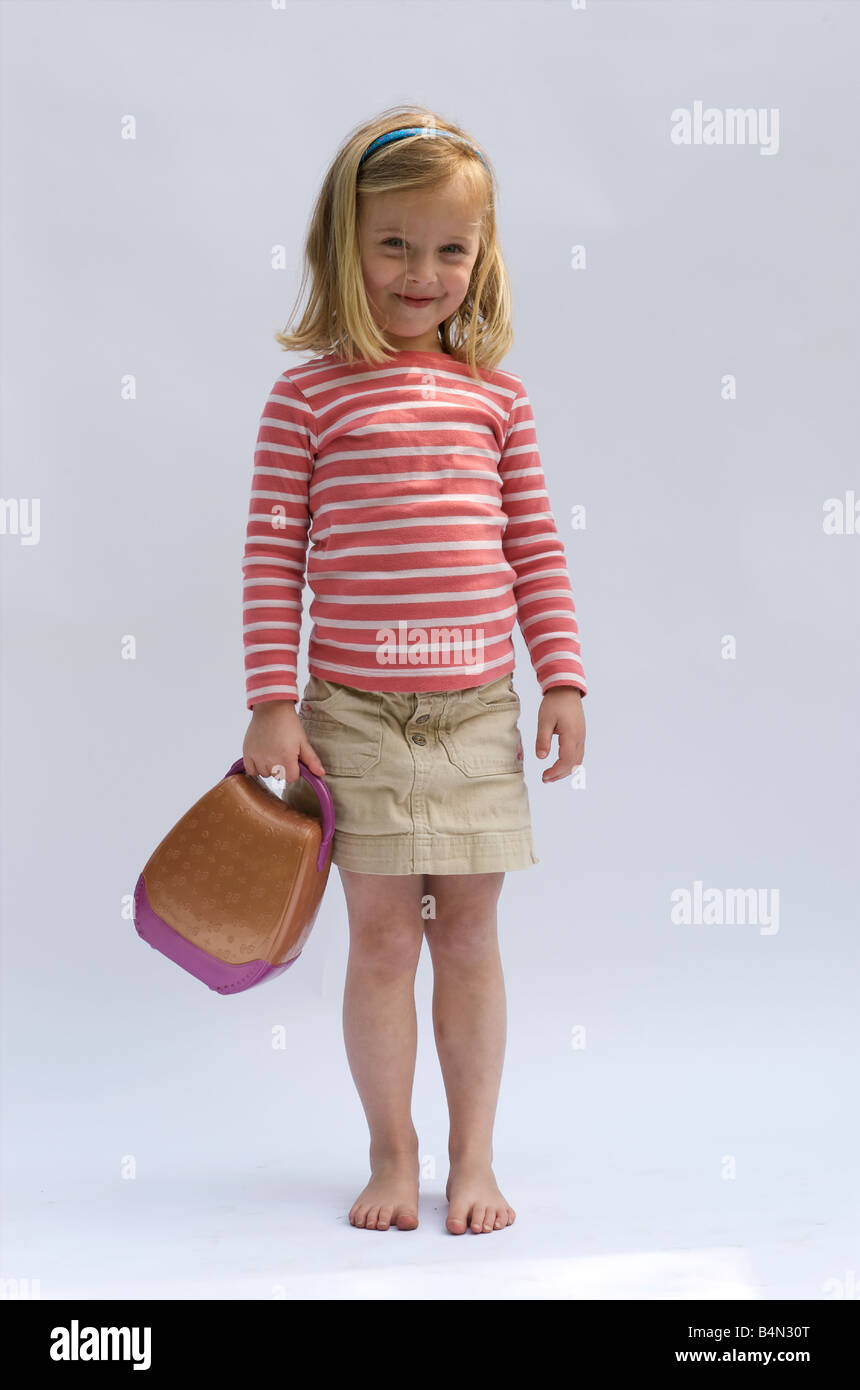 Four year old girl with handbag Stock Photo