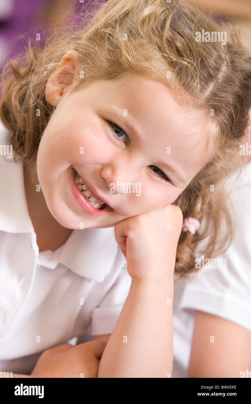Student in class smiling (selective focus) Stock Photo
