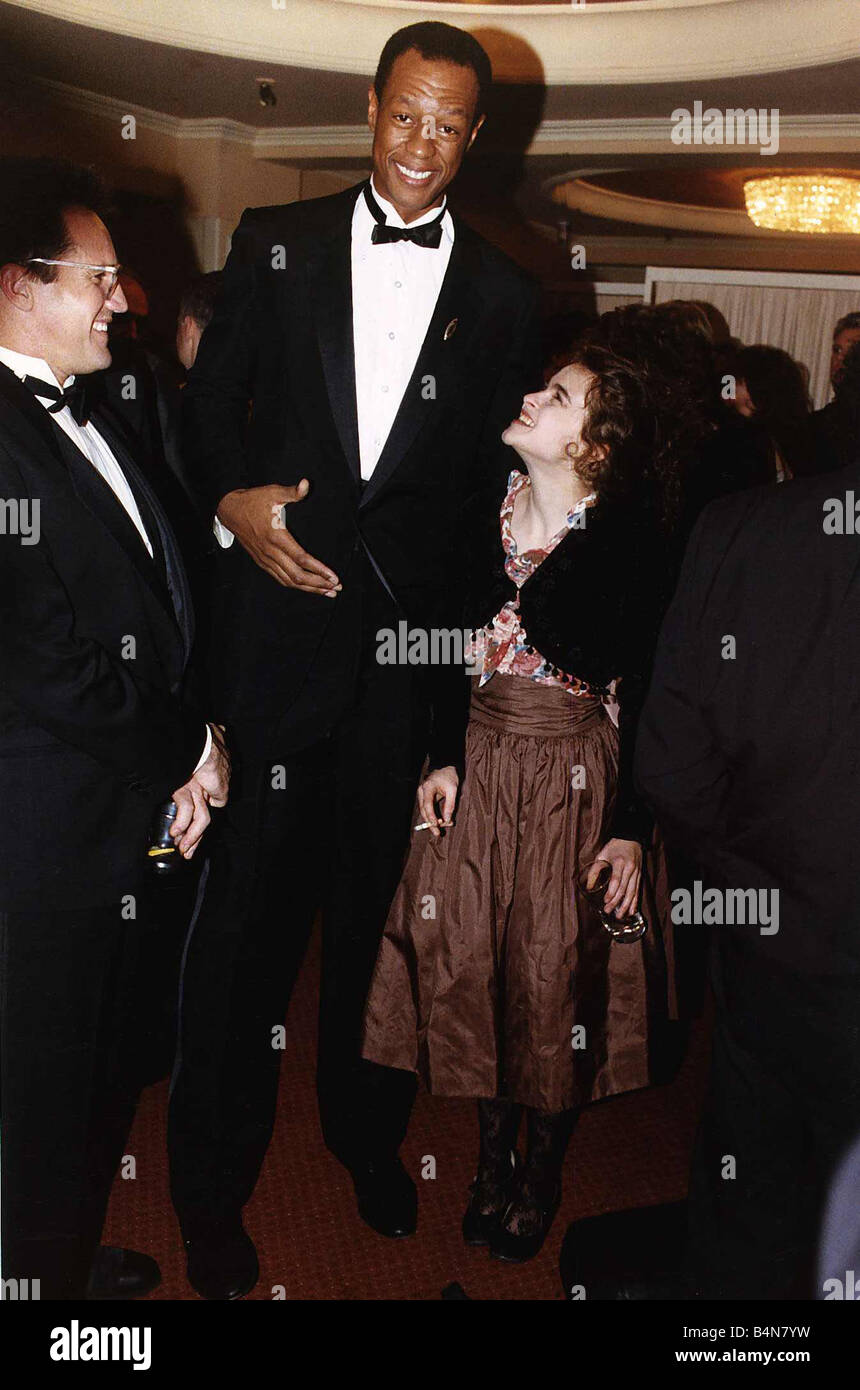 Kevin Peter Hall British actor with Helena Bonham Carter October 1988 Stock Photo