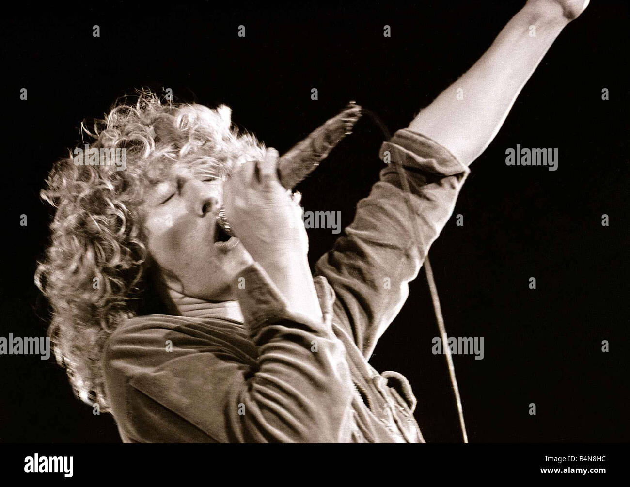 The Who in Concert May 1976 Roger Daltrey on stage singing at The