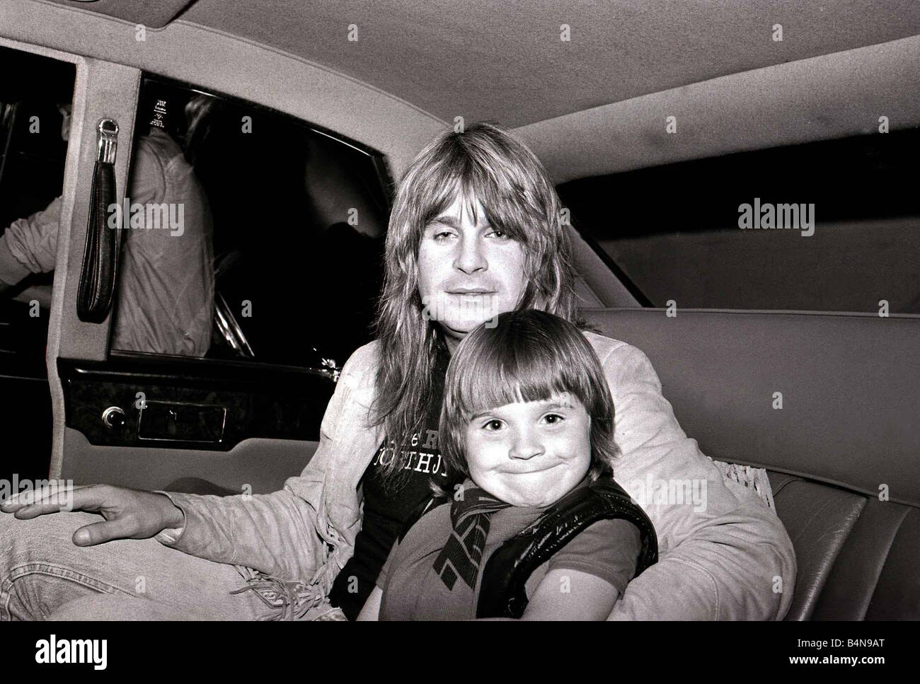 Ozzy Osbourne And His Child In 1981 Stock Photo Alamy
