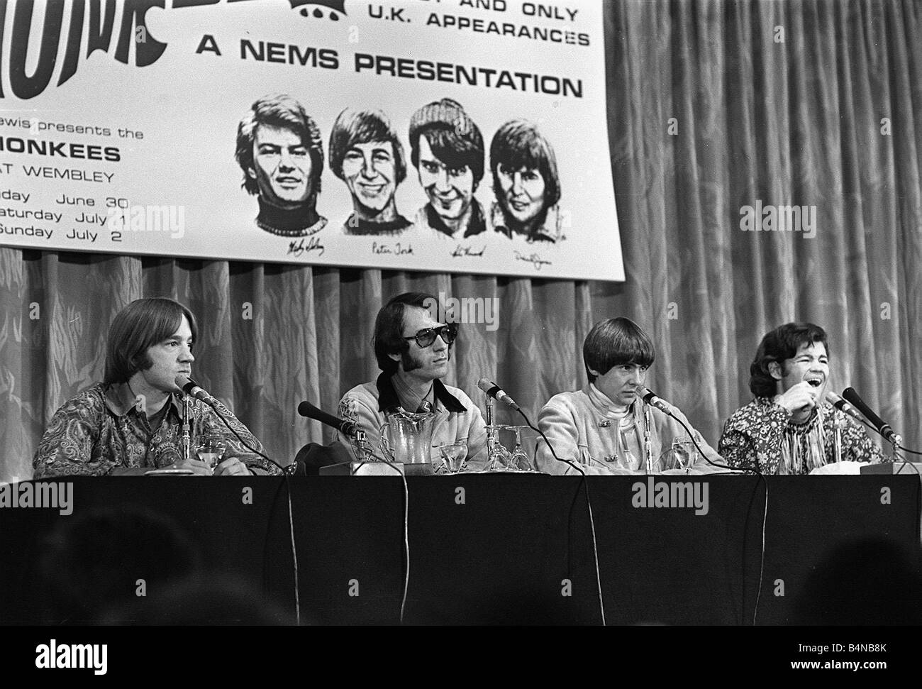Davie Jones Mickey Dolenz Mike Nesmith and Peter Tork members of 1960s pop group The Monkees at press confrence in London 1968 Stock Photo