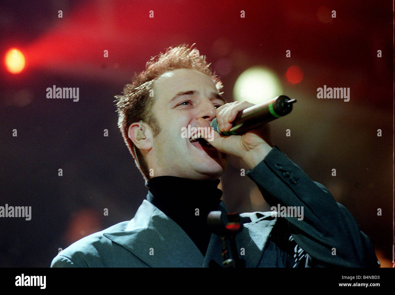 Mikey Graham of pop group Boyzone December 1999 singer singing performing at the SSEC in Glasgow Stock Photo