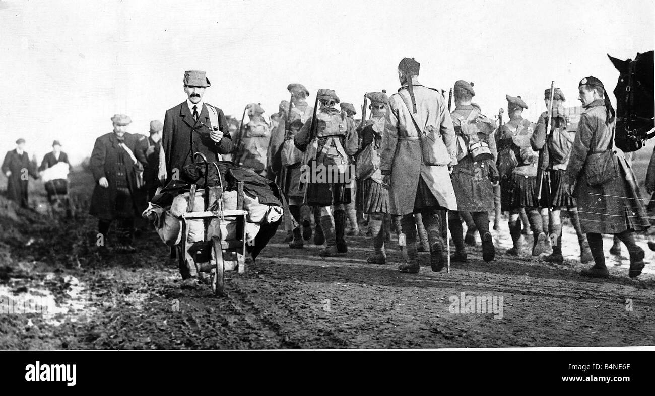 World War One Canadian kilties march at Mons passing French civilians 1918 Stock Photo