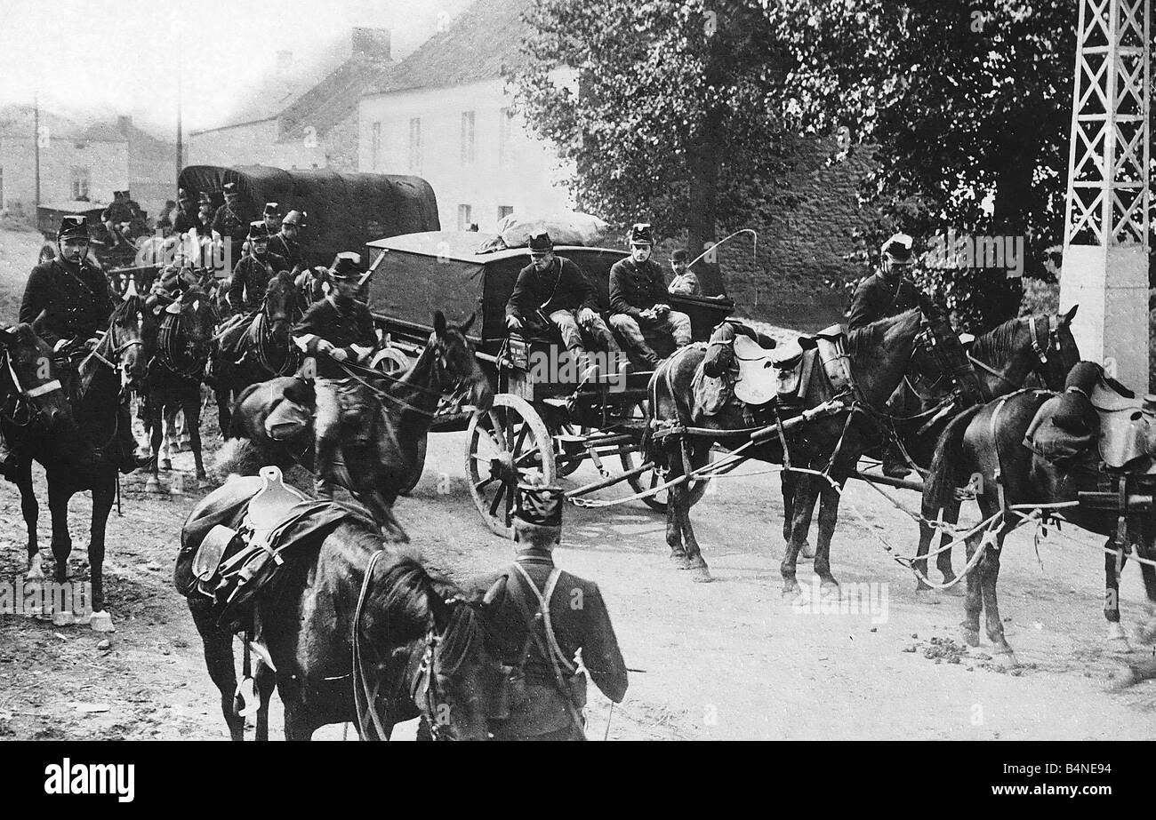 World War One Belgian troop on horseback guard a food convoy carriage on its way to Liege 1914 Stock Photo