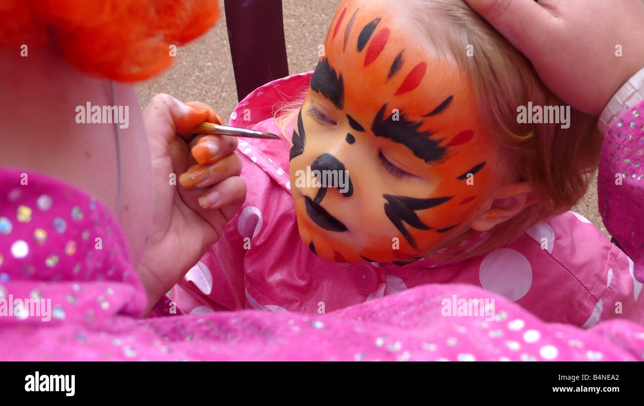 child having face painted Stock Photo