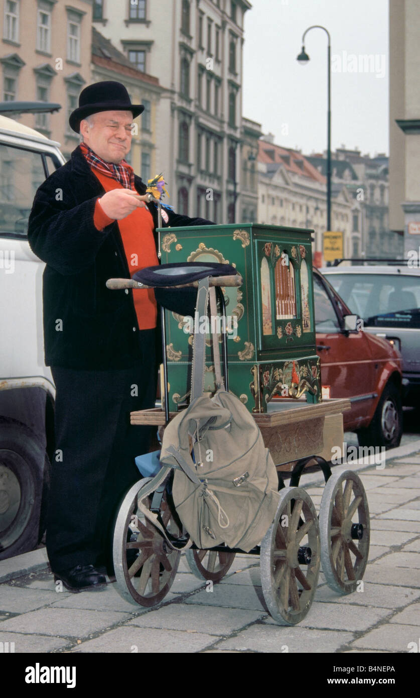 Street organ grinder at Market at Am Hof in Vienna Austria Stock Photo