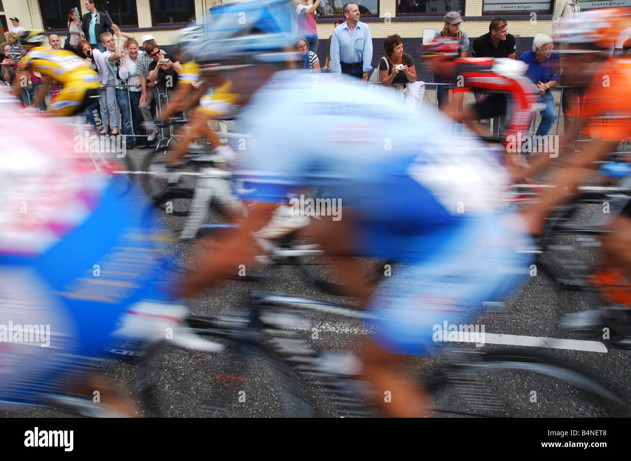 Group cyclists passing in street hi-res stock photography and images ...