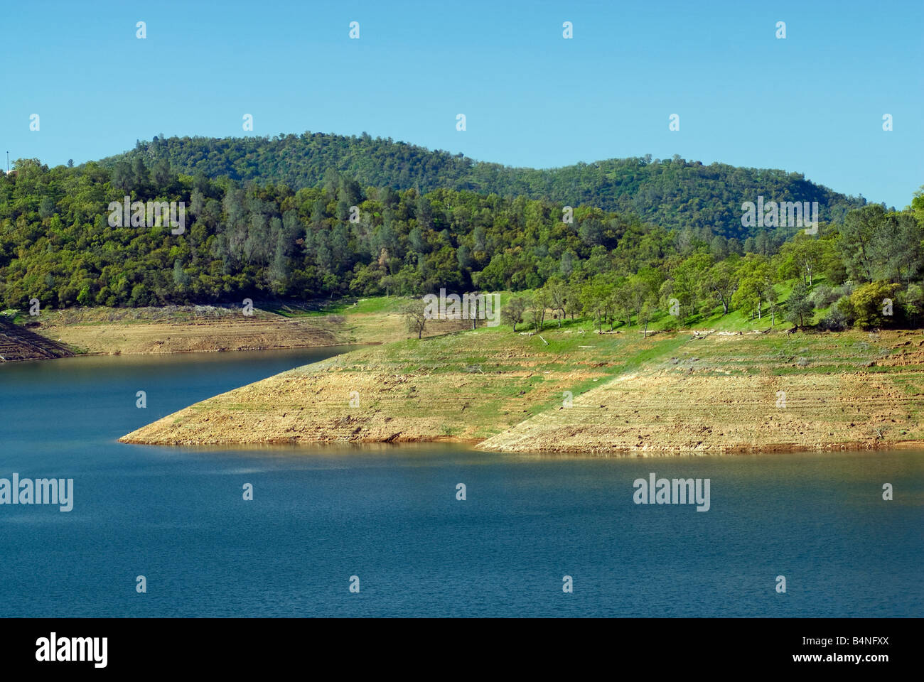 Low water level at New Melones Lake on Stanislaus River view from Stock
