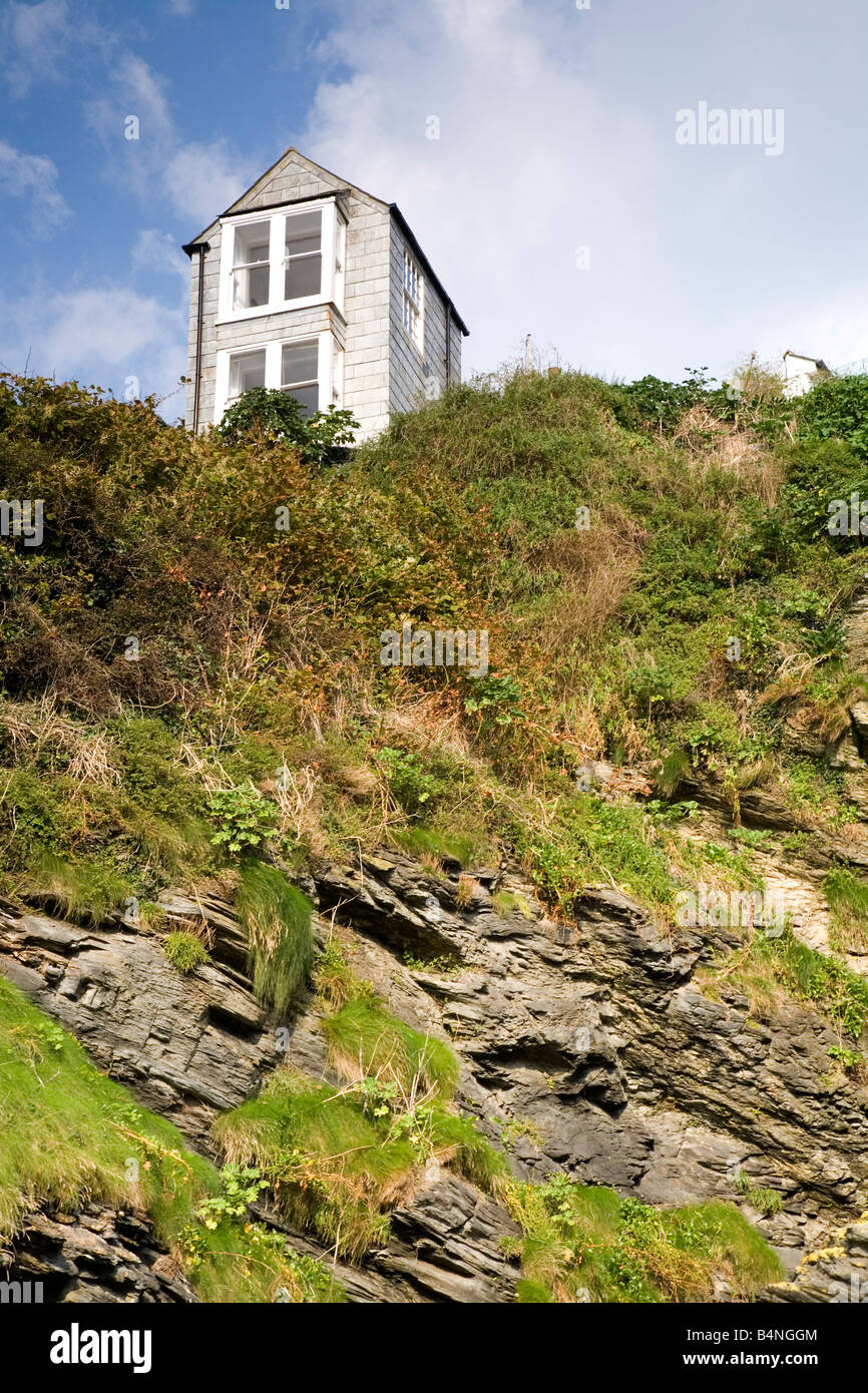 Tiny house perched at the top of a cliff in Port Isaac Cornwall Stock Photo