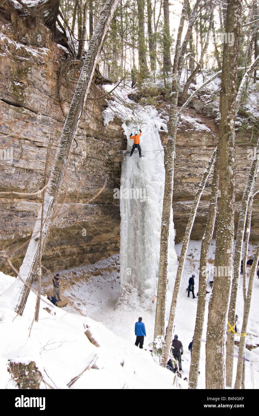 Ice climbing during Michigan Ice Fest at Pictured Rocks National Lakeshore in Munising Michigan