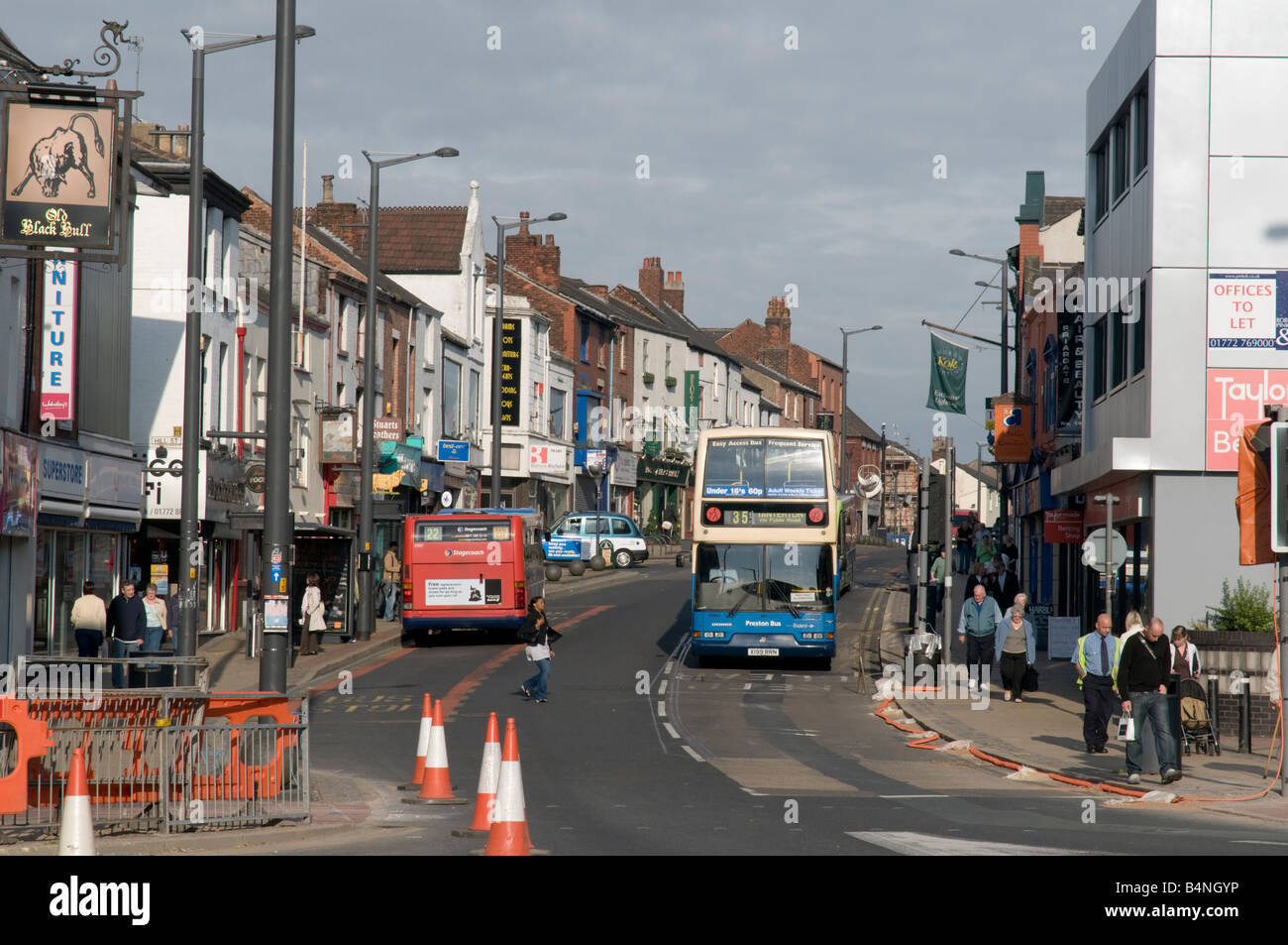 Buses on Friargate shopping street, Preston city centre Lancashire England UK, summer morning Stock Photo
