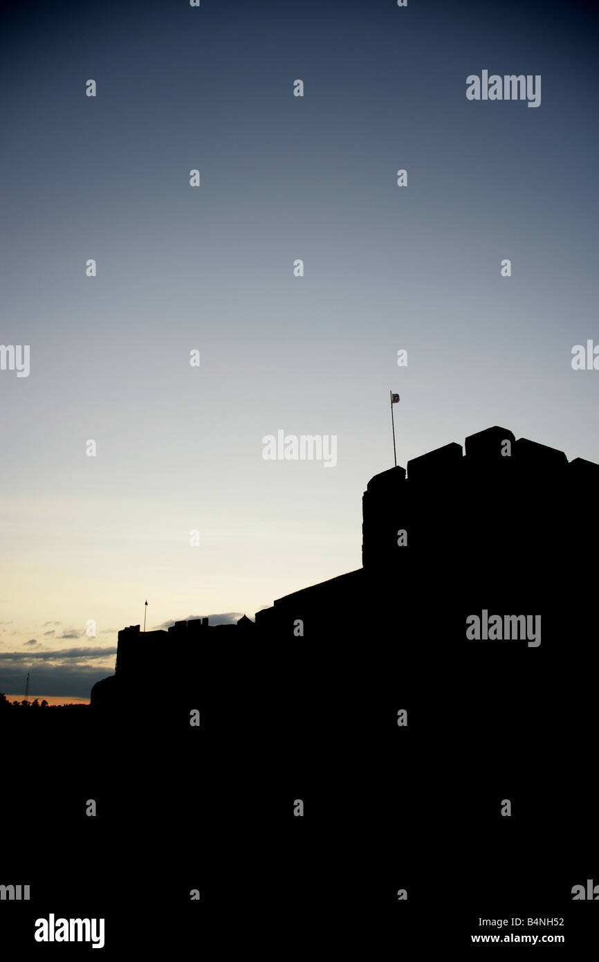 City of Carlisle, England. Silhouetted view of the south façade of the historic and ancient fortress of Carlisle Castle. Stock Photo