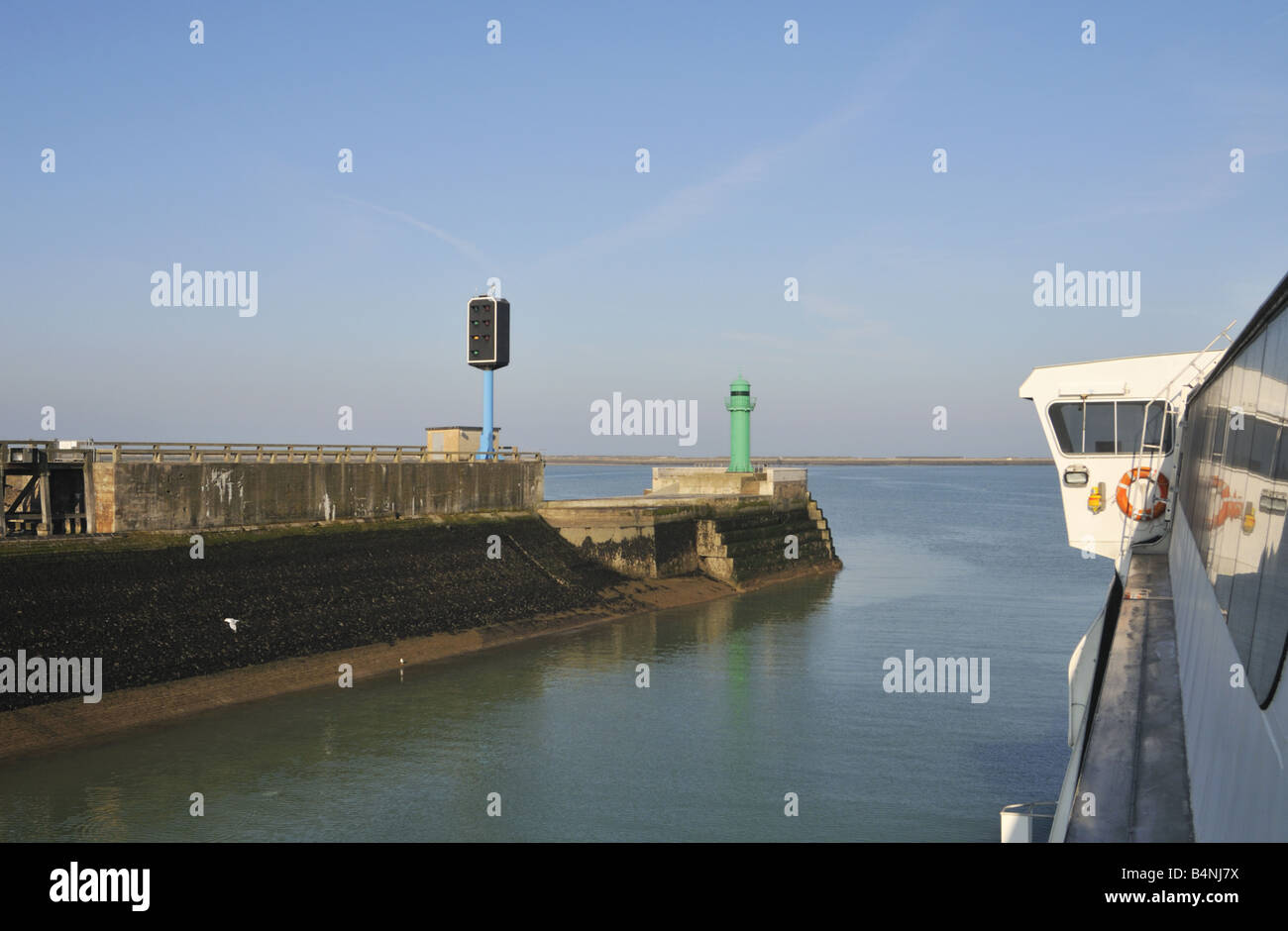Signals and lighthouse at the port of Boulogne France Stock Photo