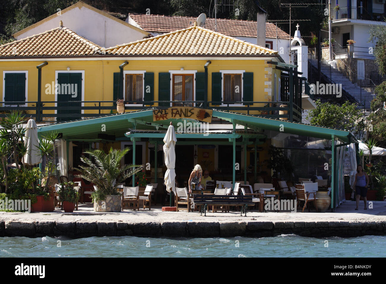 View of Fanis cafe restaurant in the village of Lakka in Paxos, Greek Ionian Island Greece Stock Photo