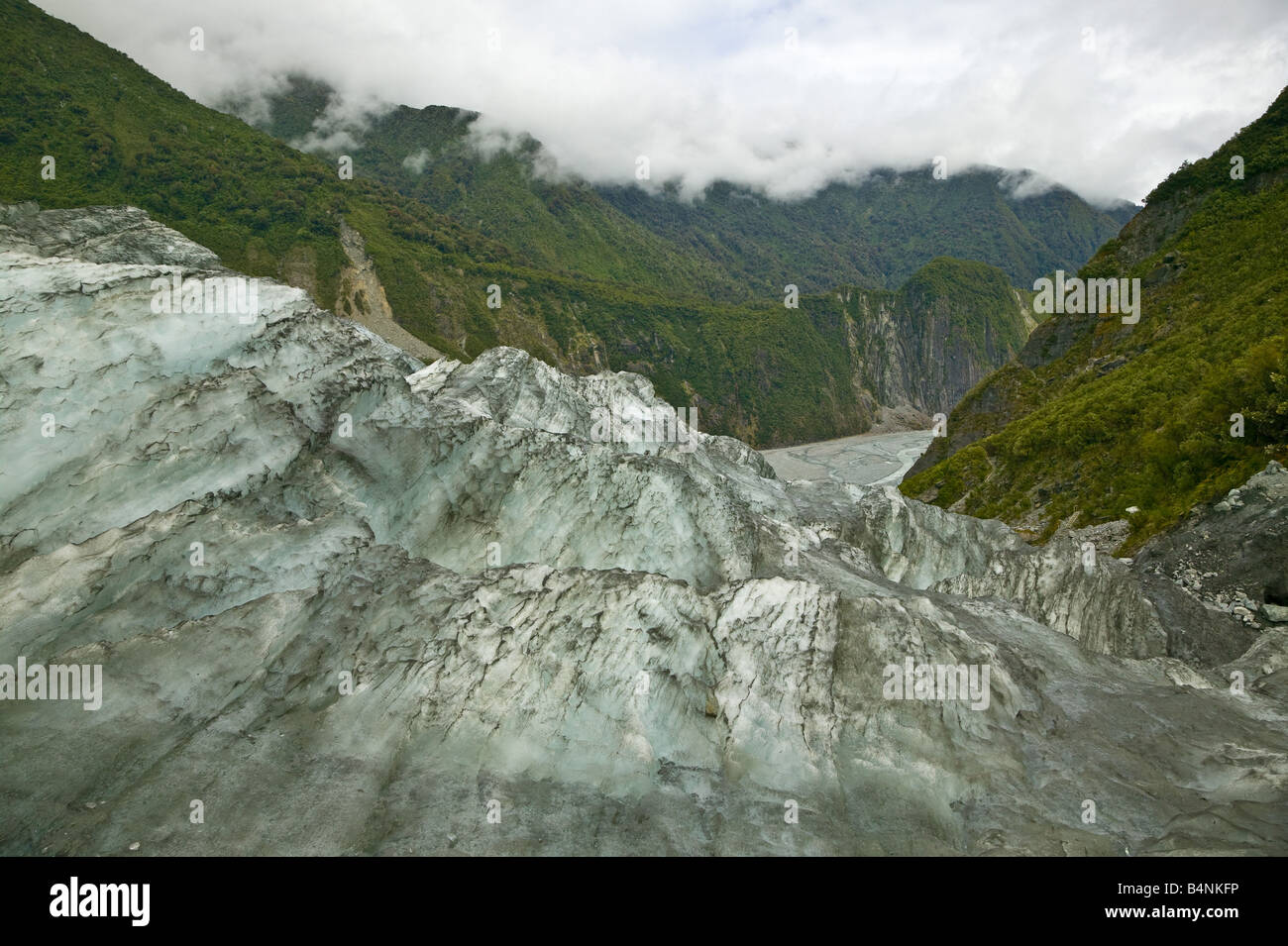 View of Fox Glacier and the green valley below on the South Island of New Zealand Stock Photo