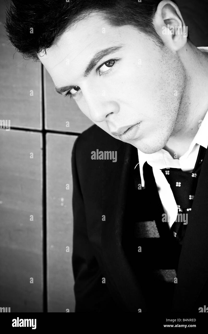 Staring businessman in dark black and white Stock Photo