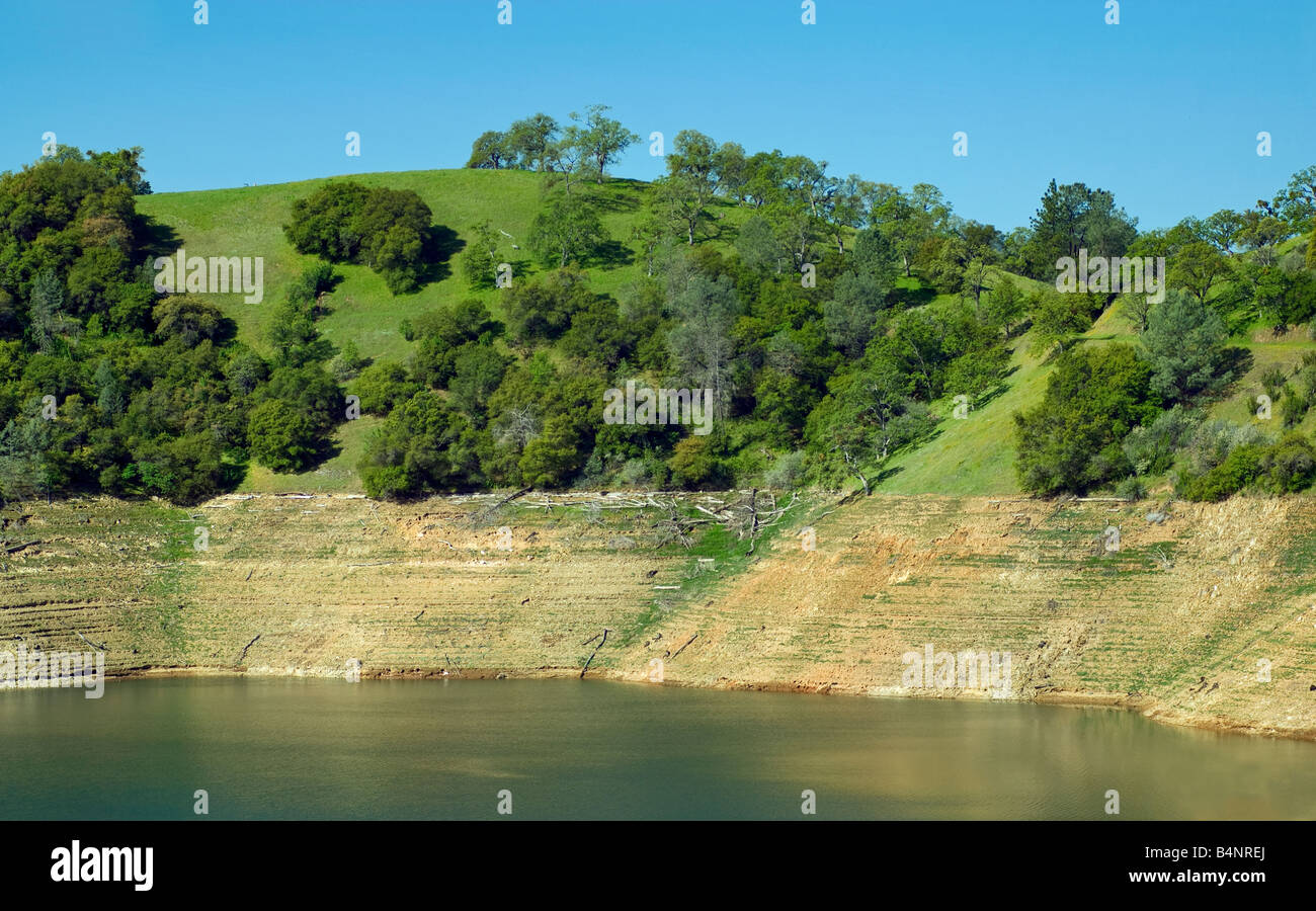 Low water level at New Melones Lake on Stanislaus River view from Parrots Ferry Bridge near Jamestown Gold Country California Stock Photo