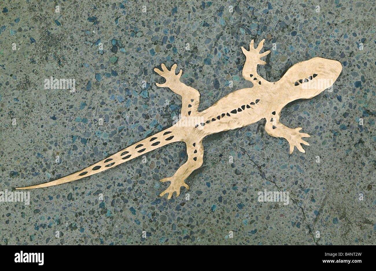 Brass lizard in the pavement at Cathedral Junction, Christchurch, South Island, New Zealand Stock Photo