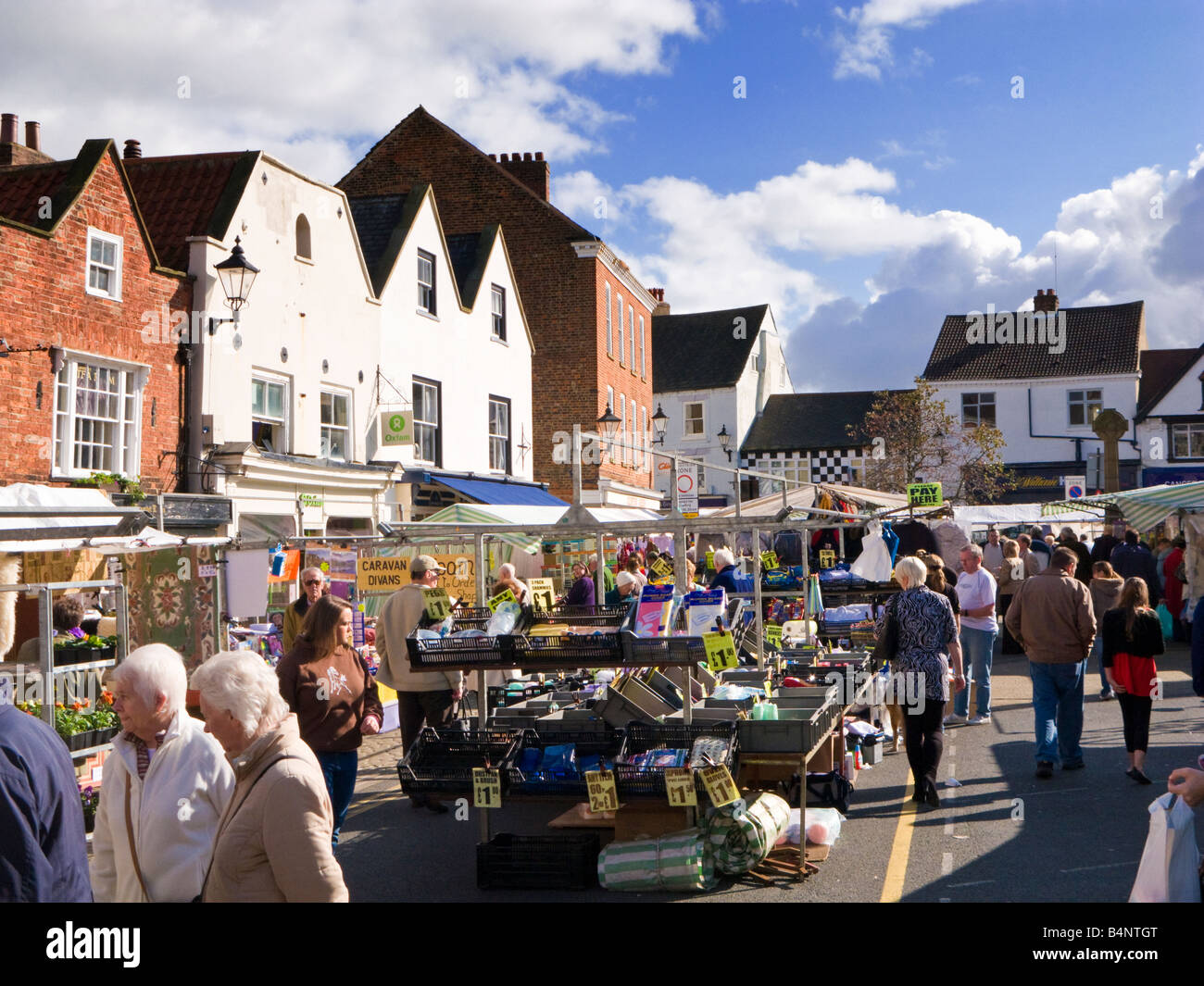 The crowded market in the Market Place at Knaresborough, North Yorkshire, England, UK Stock Photo