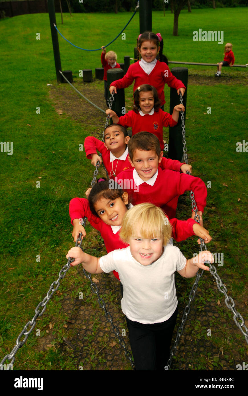 Primary school pupils in playground, Hanworth, Middlesex, UK Stock ...