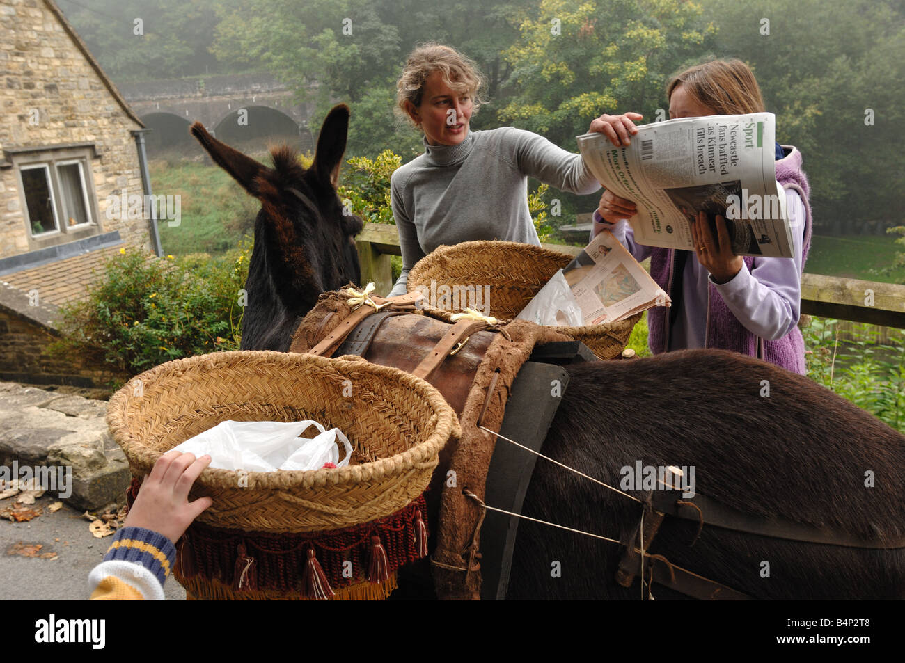 Delivering produce from the local community owned shop by donkey in