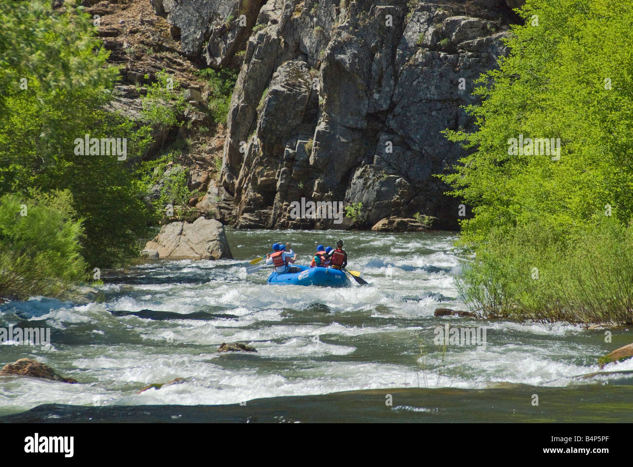 Inflatable rafts shooting the Kern River rapids Sierra Nevada California USA Stock Photo