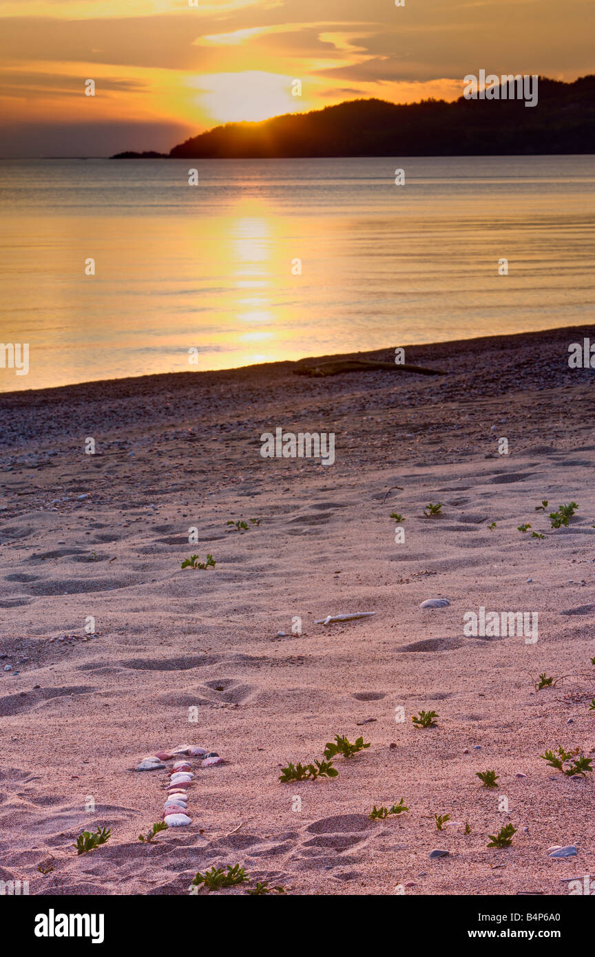 Arrow rock design along the beach in Agawa Bay at sunset, Lake Superior, Lake Superior Provincial Park, Ontario, Canada. Stock Photo