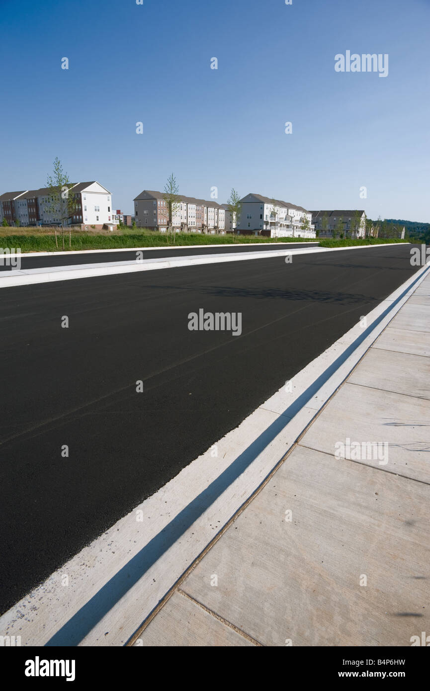 New condos, pavement and sidewalk near Pleasant Hill Road Owings Mills Maryland Stock Photo Alamy