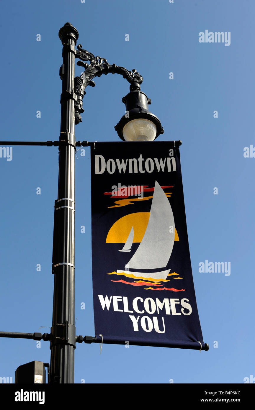 Generic Downtown Welcomes you sigh on lamp post Stock Photo