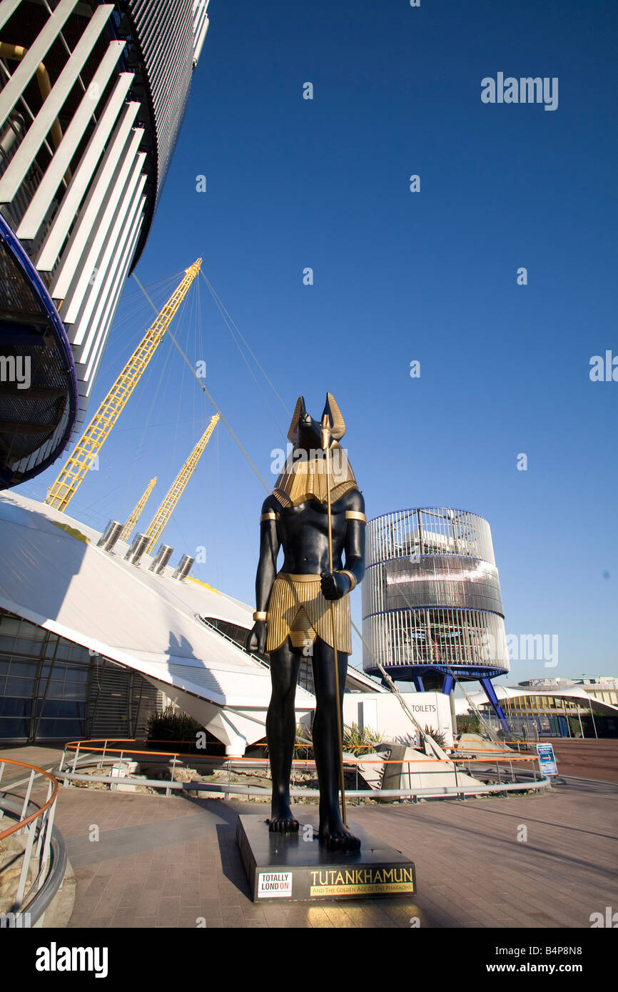 O2 Arena, entrance London Millennium Dome. Morning Blue sky Statue of Anubis - Tutankhamun exhibition  Vertical 77498 London-O2 Stock Photo