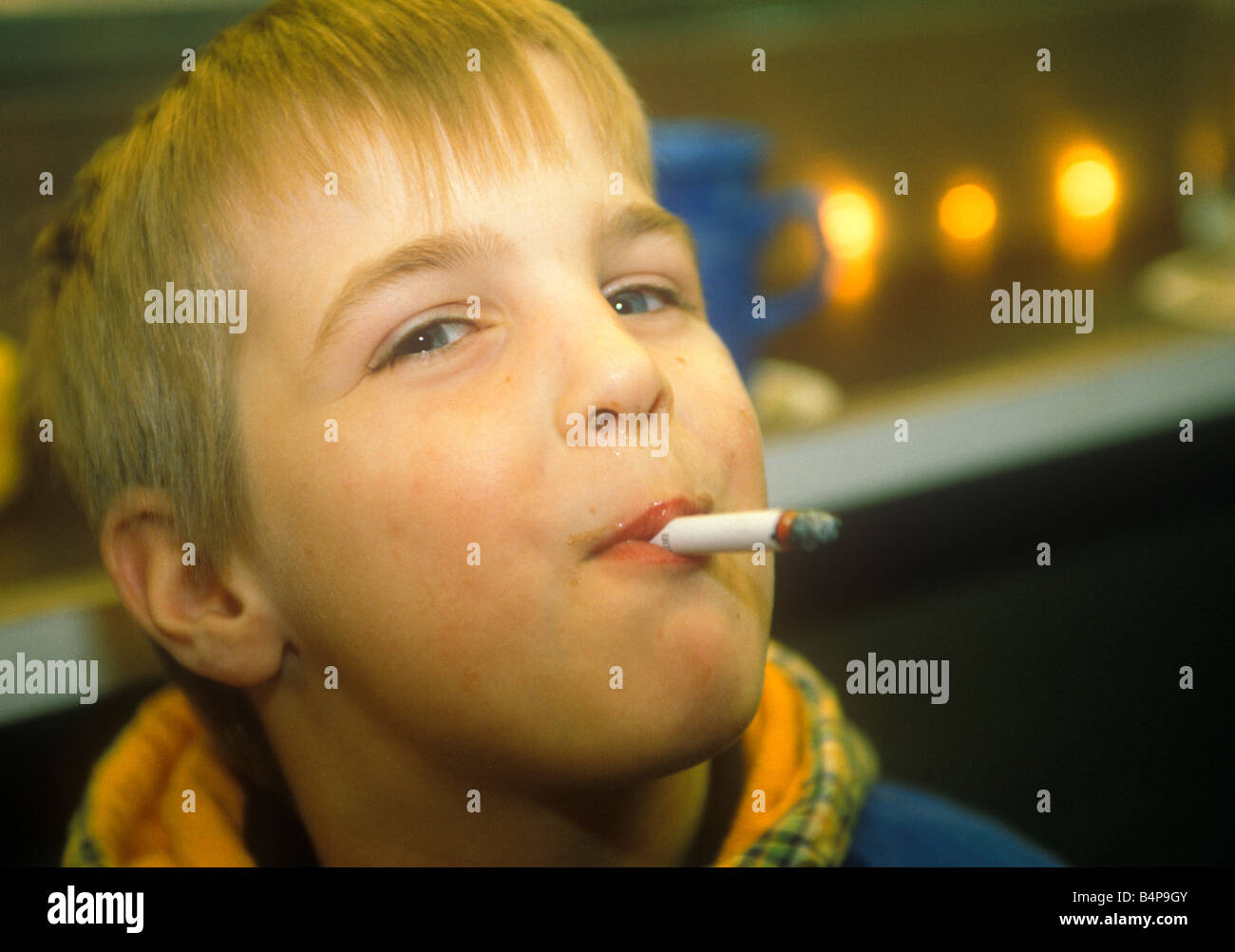 cigarette little smokers Small boy smoking a cigarette Stock Photo